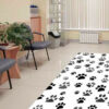 alfombra-pvc-veterinaria-huellas-negras