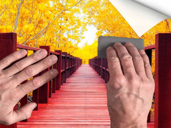 fotomural-puente-madera-otoñal-manos